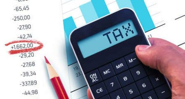 A calculate shows the word "tax"